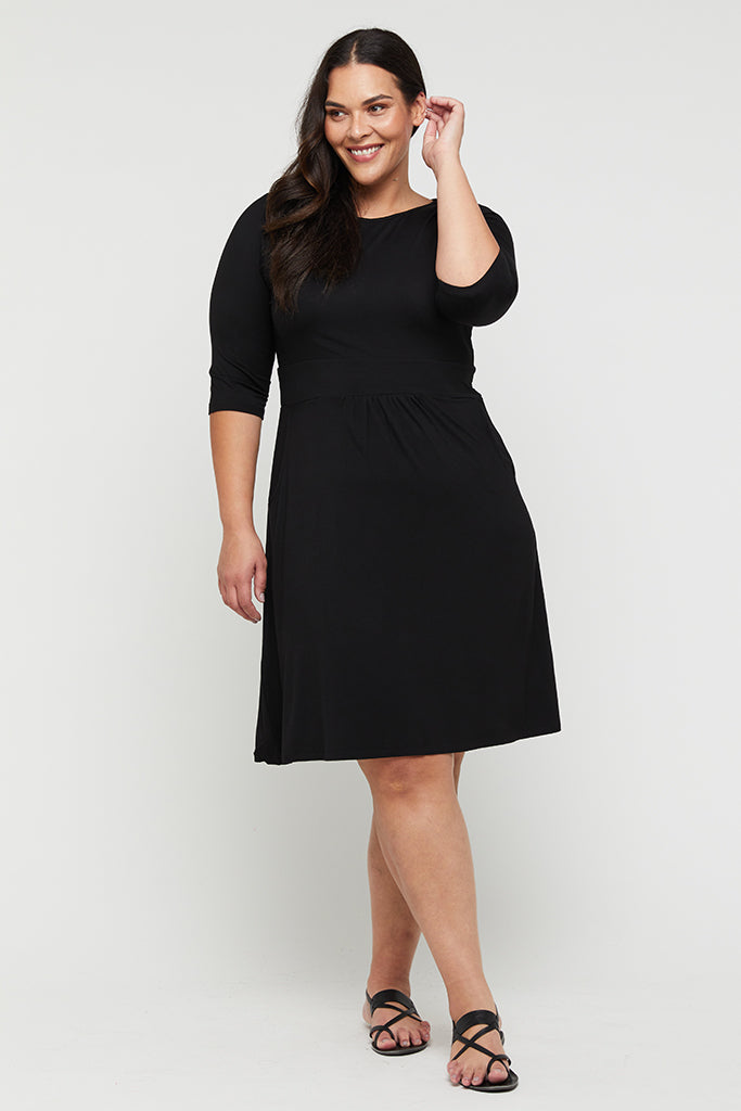 Plus size bamboo dress with 3/4 length sleeves, high neckline and in built waistband
