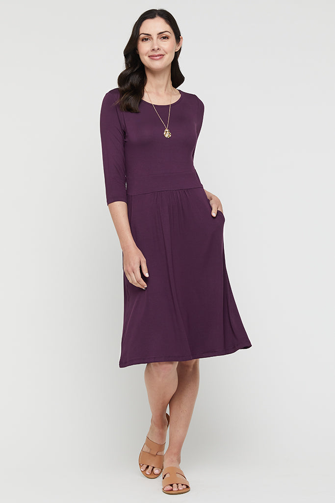 3/4 sleeve bamboo dress in plum purple paired with tan slides