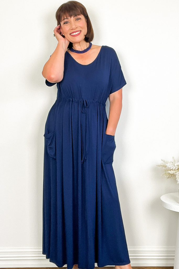 Eco-friendly navy maxi dress with soft bamboo fabric and side pockets.