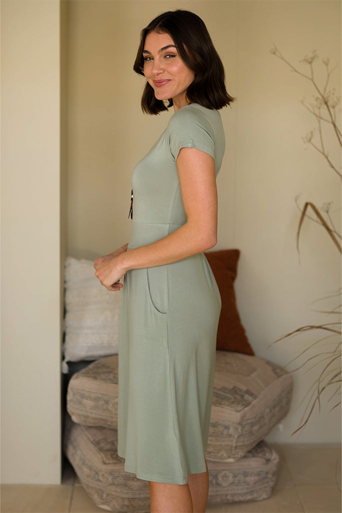 Side view of short sleeved dress made out of stretchy and breathable bamboo.