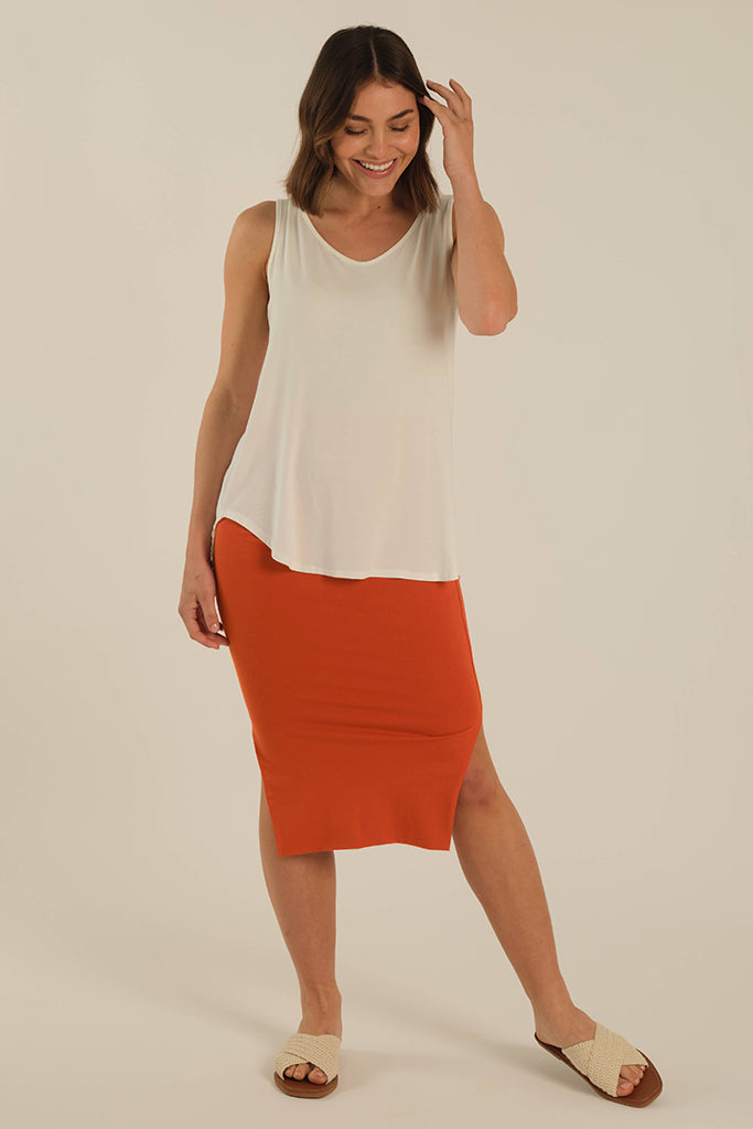 Midi length orange skirt with side splits