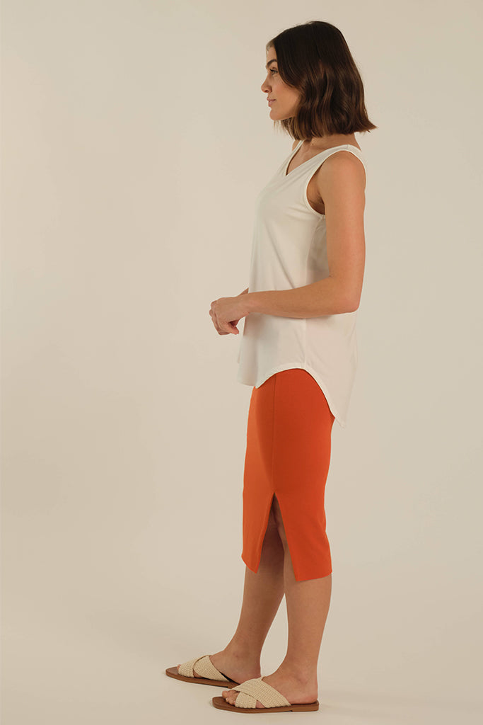 Midi skirt with side splits paired with a relaxed singlet