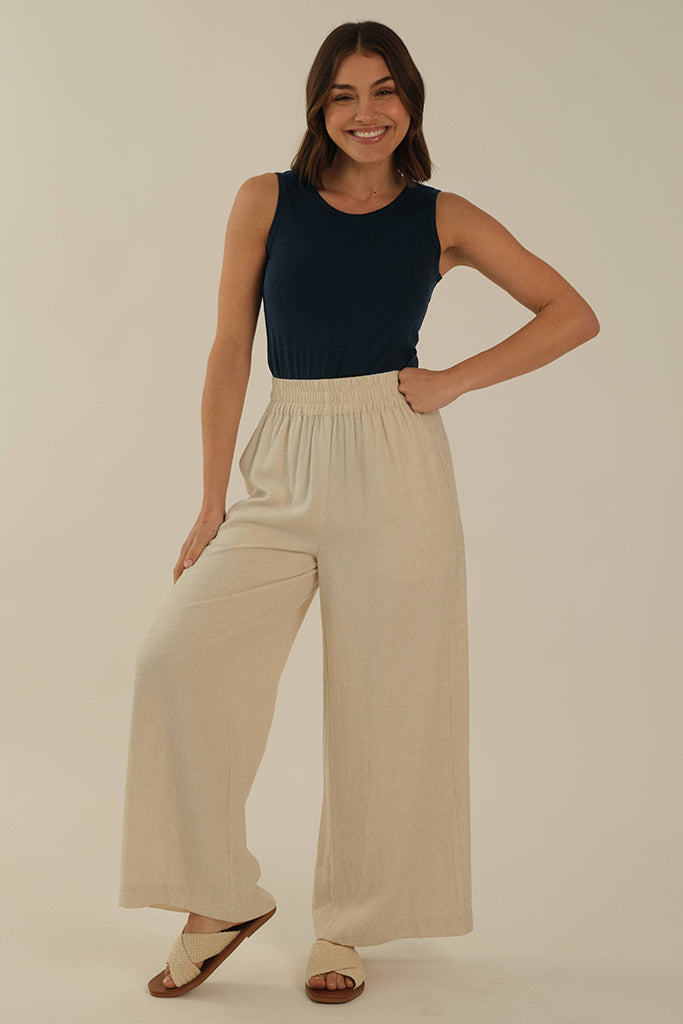 Snug fitted dark blue tank top with wide straps for good coverage