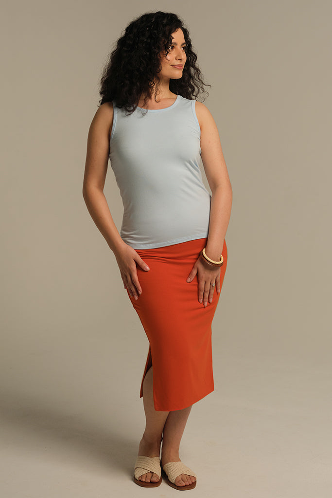 Fitted pale blue singlet featuring a high scoop neckline