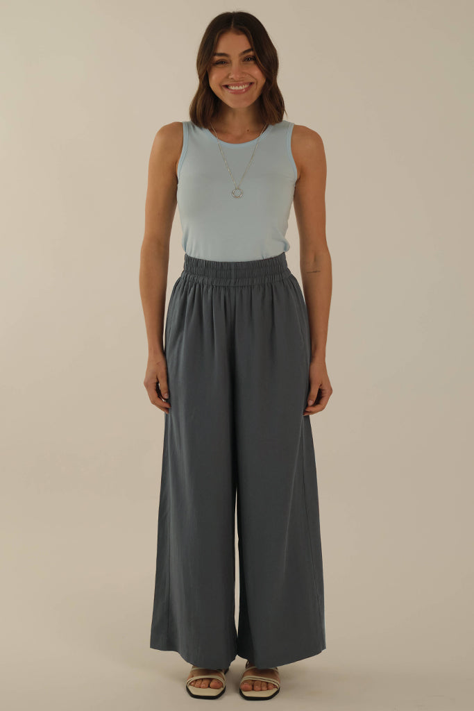 Singlet with wide shoulder straps for bra and sun coverage.