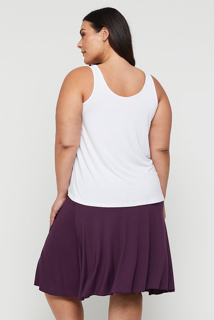 curvy mini skirt with soft pleats in purple colourway