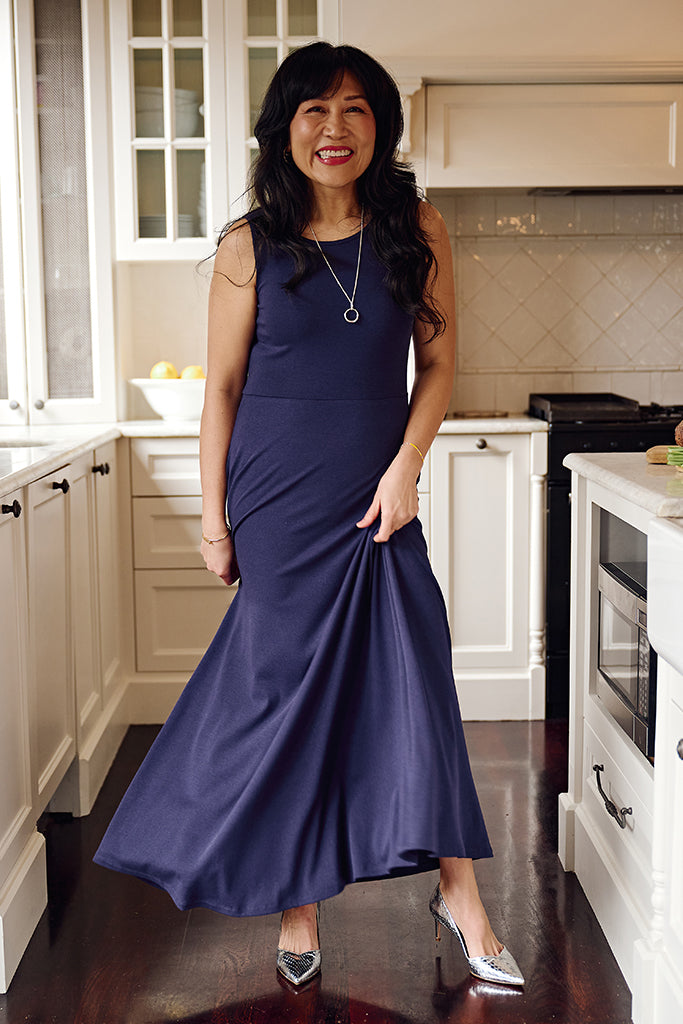 A-line indigo maxi dress with supportive straps and an easy-to-wear flowing skirt.