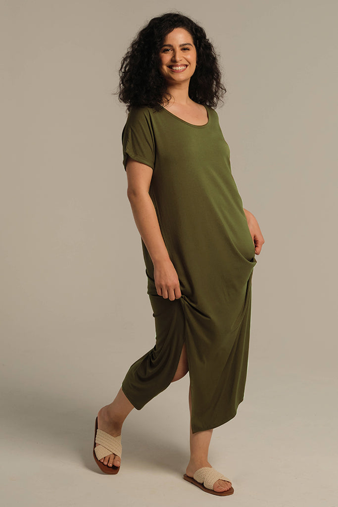Model wearing comfortable dark olive bamboo maxi dress with loose, oversized fit