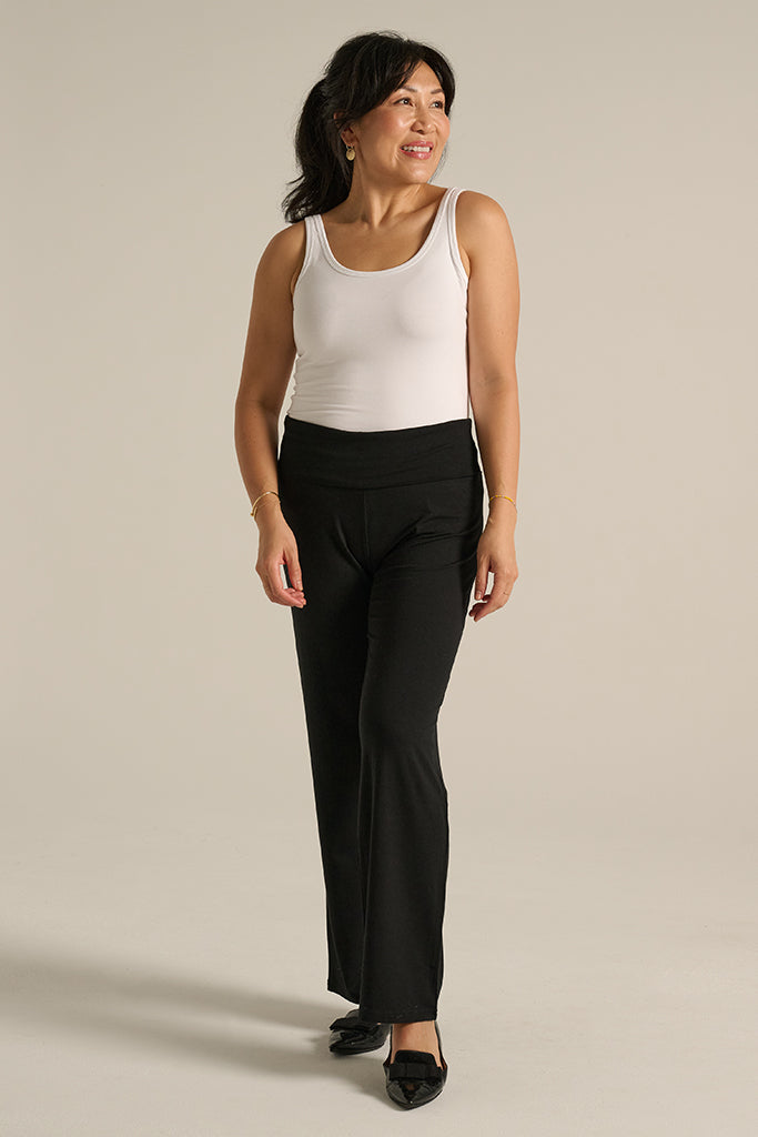 Black bamboo lounge pants styled with a white bamboo tank top