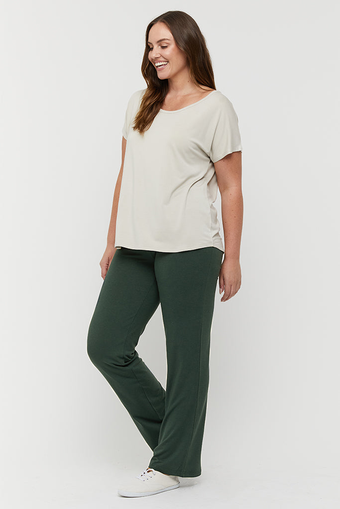 Lightweight forest green pants with relaxed legs and a flexible waistband