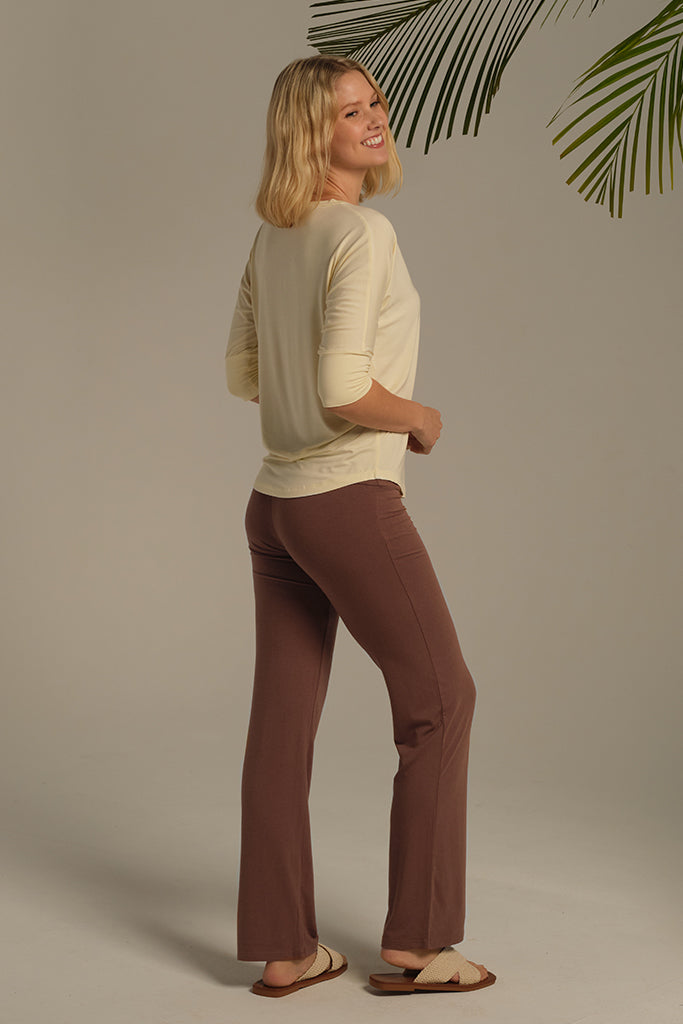 Mousse-coloured bamboo pants made for movement and comfort.