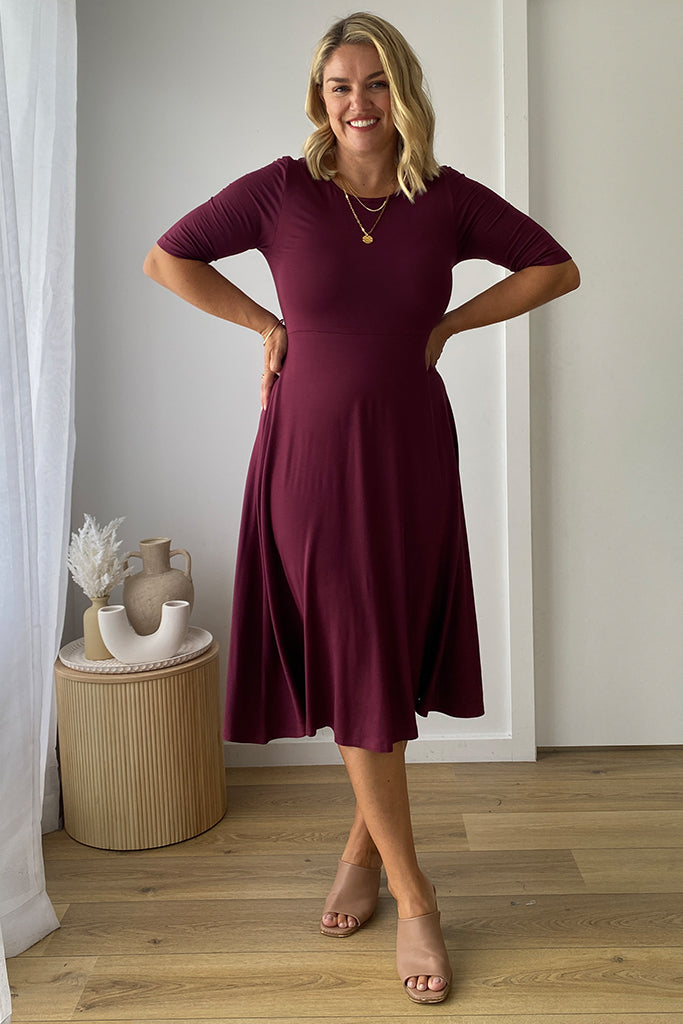 Burgundy midi dress perfect for work, travel or everyday wear.