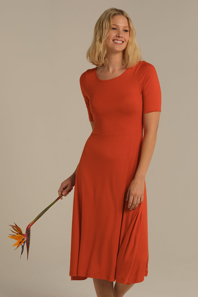 Feminine midi dress made out of sustainable bamboo fabric.