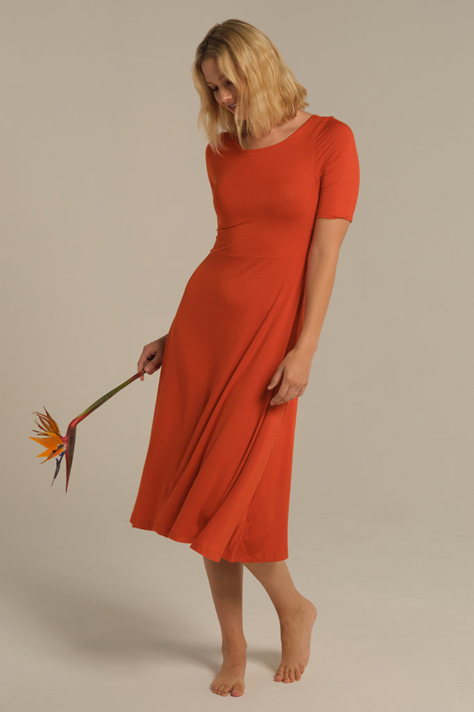 Comfortable and floaty bamboo midi dress in orange.