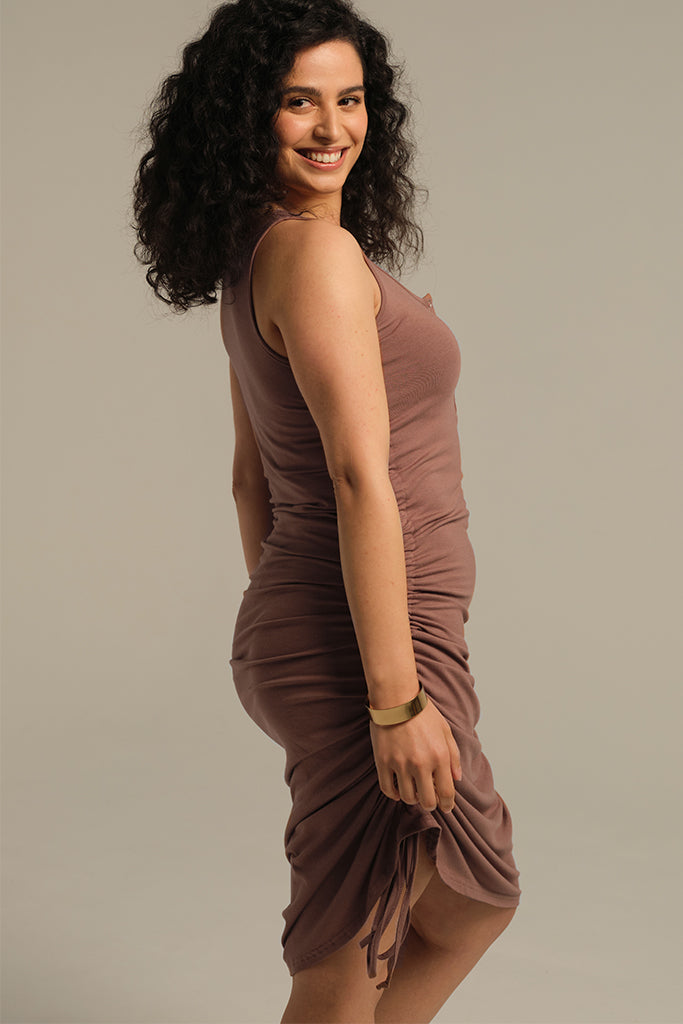 Side view of casual sleeveless Henley dress in Mousse.