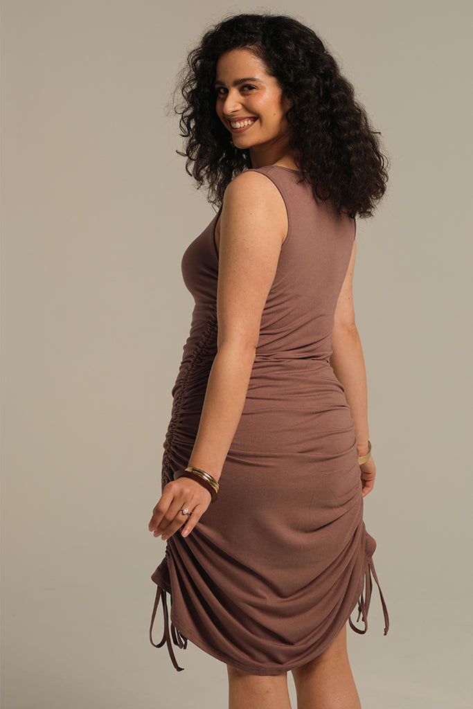 Side view of sustainably made bamboo tank dress in soft mousse colour