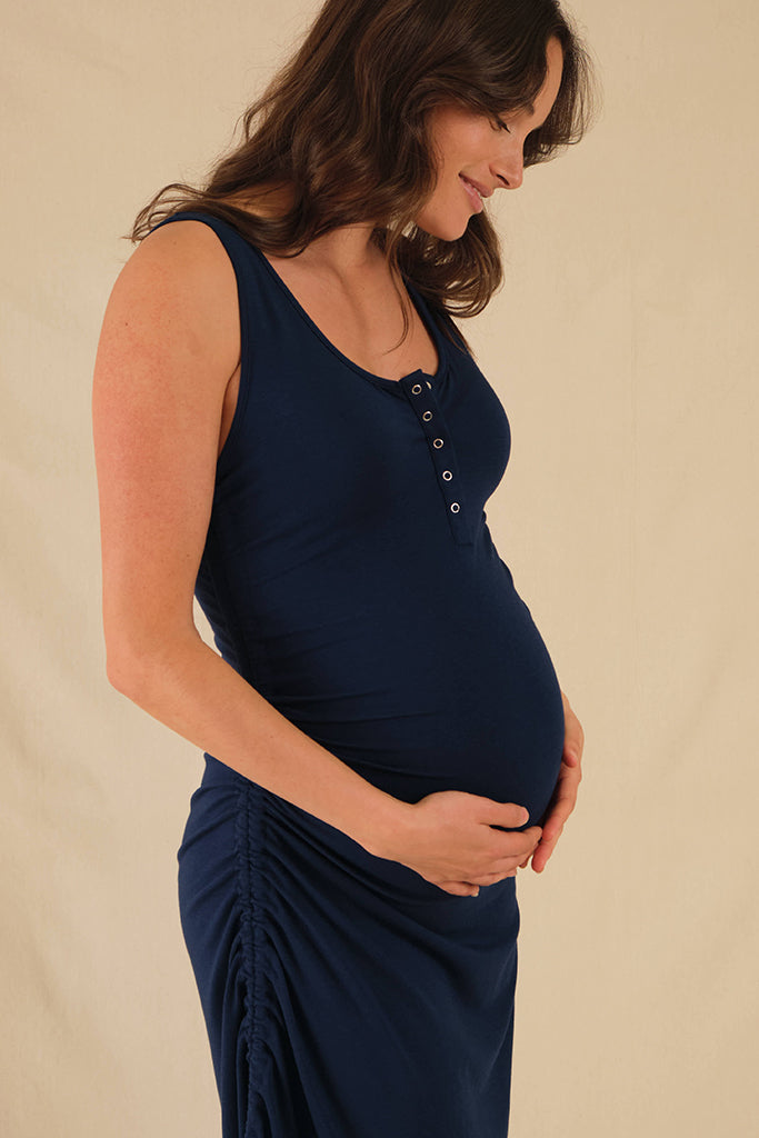 Close-up of neckline and button detail on navy bamboo Henley dress, bump and nursing friendly.