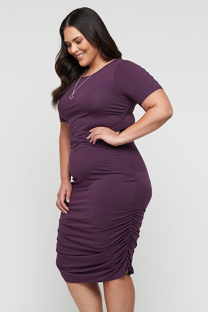 Side view of stretchy bamboo ruched dress in pruple