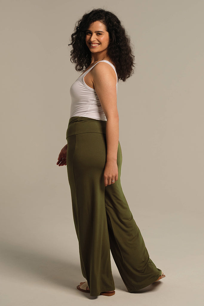 back view of the wide leg pants in khaki colourway with wide stretchy waistband
