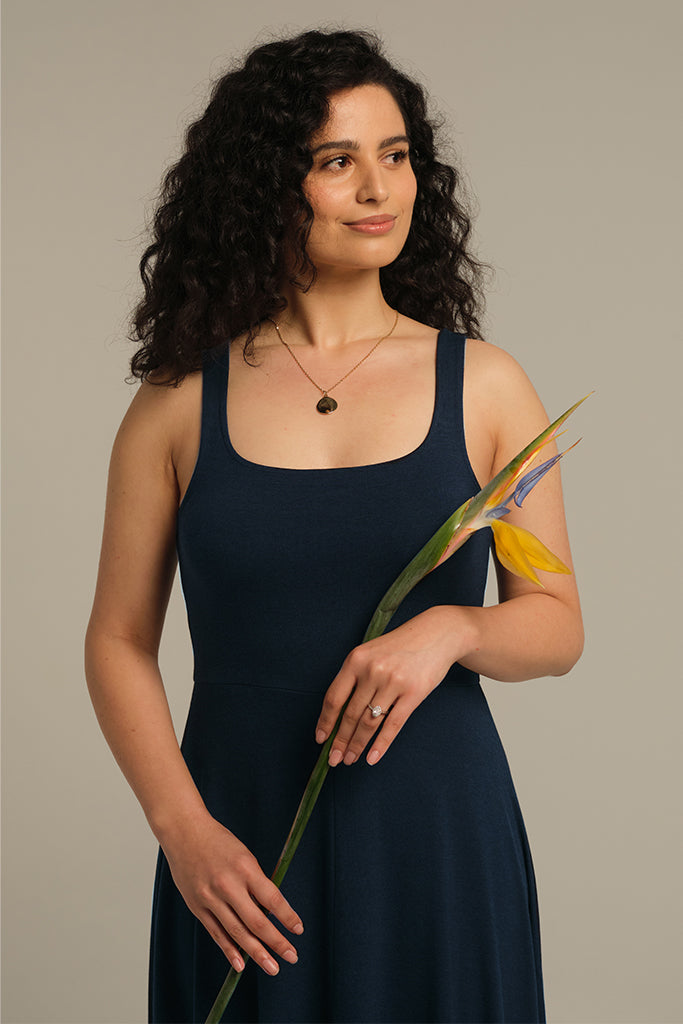 Close up of bamboo midi dress in dark navy.