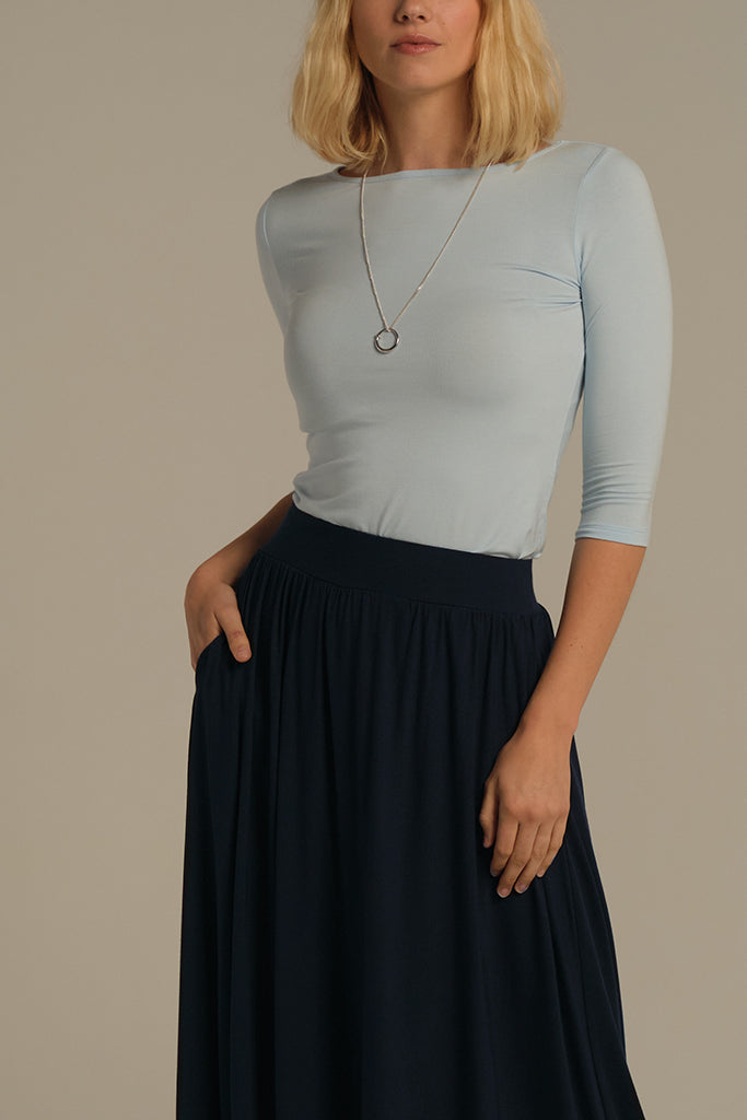 Skirt styled for work with tucked-in top