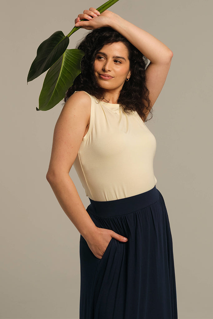 Cozy bamboo outfit of tank top and pleated skirt with pockets