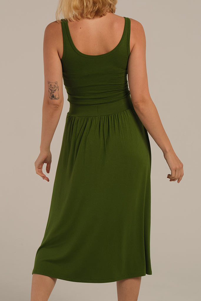 back view of the midi length skirt in garden green with elastic waistband