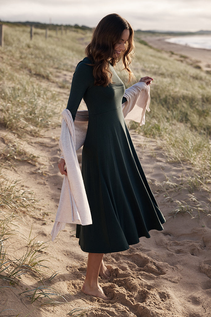 Olivia Dress in green with flattering seam and soft a-line shape.