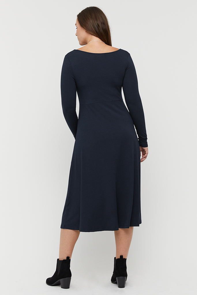 Back view of Dark Navy Olivia Dress, highlighting breathable bamboo fabric and flowy silhouette.