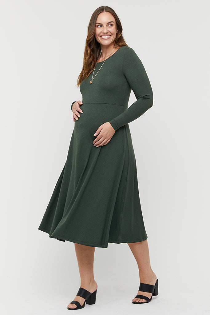 Green maternity dress made out of breathable bamboo fabric.