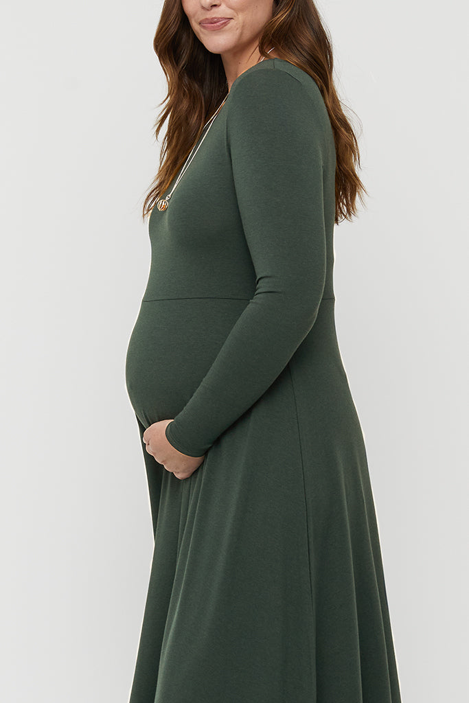 Close-up of breathable and lightweight bamboo fabric on maternity dress designed for growing bump comfort.