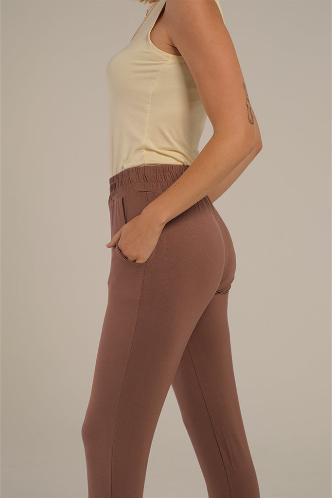 a side view of the pockets and waistband on the peggy bamboo pants in chocolate mousse colourway