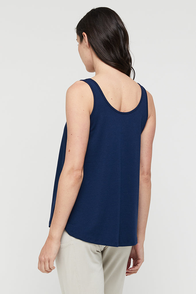 Back view of a navy stretchy bamboo singlet with curved neckline