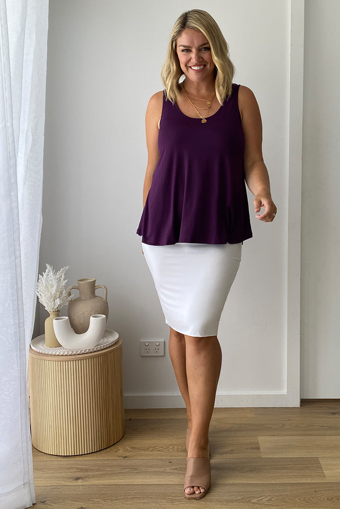 Woman wearing plum shaded a-line soft bamboo singlet