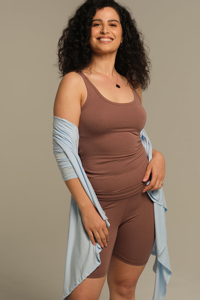 Brownish figure hugging singlet with low neckline