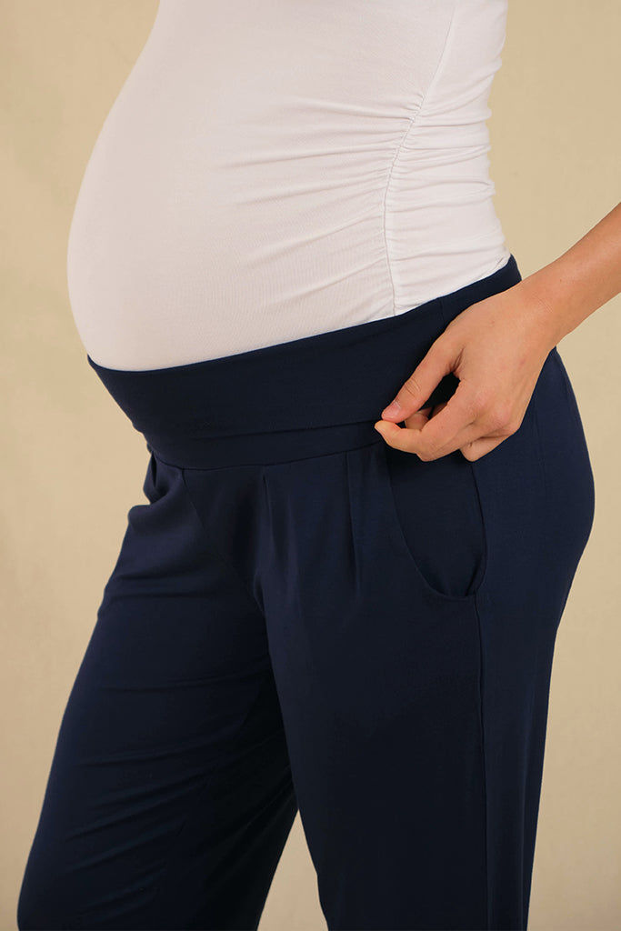a close up view of the bump friendly slouch pants with a soft and stretchy fabric waistband