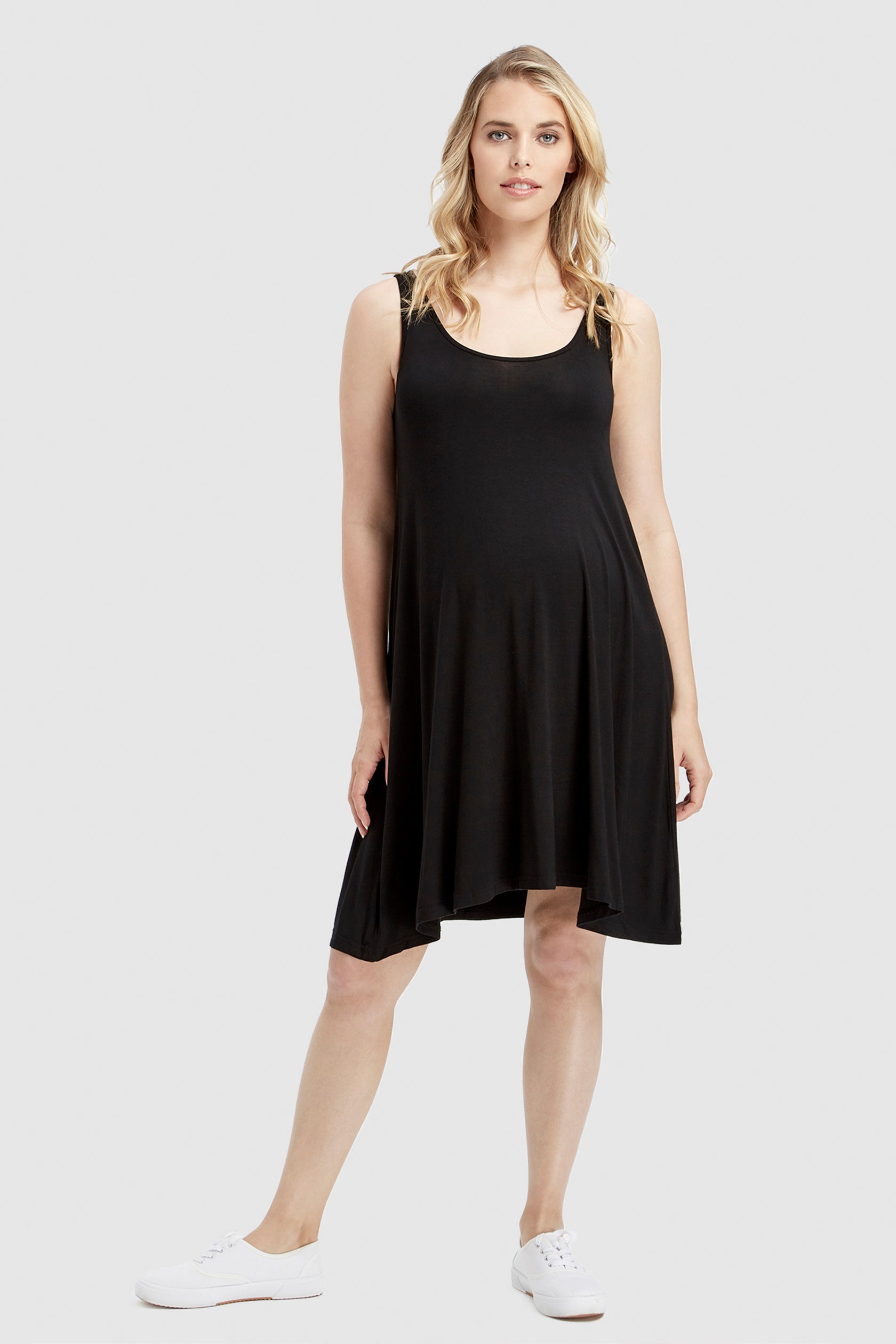 Versatile black maternity dress with loose fit, ideal for all trimesters