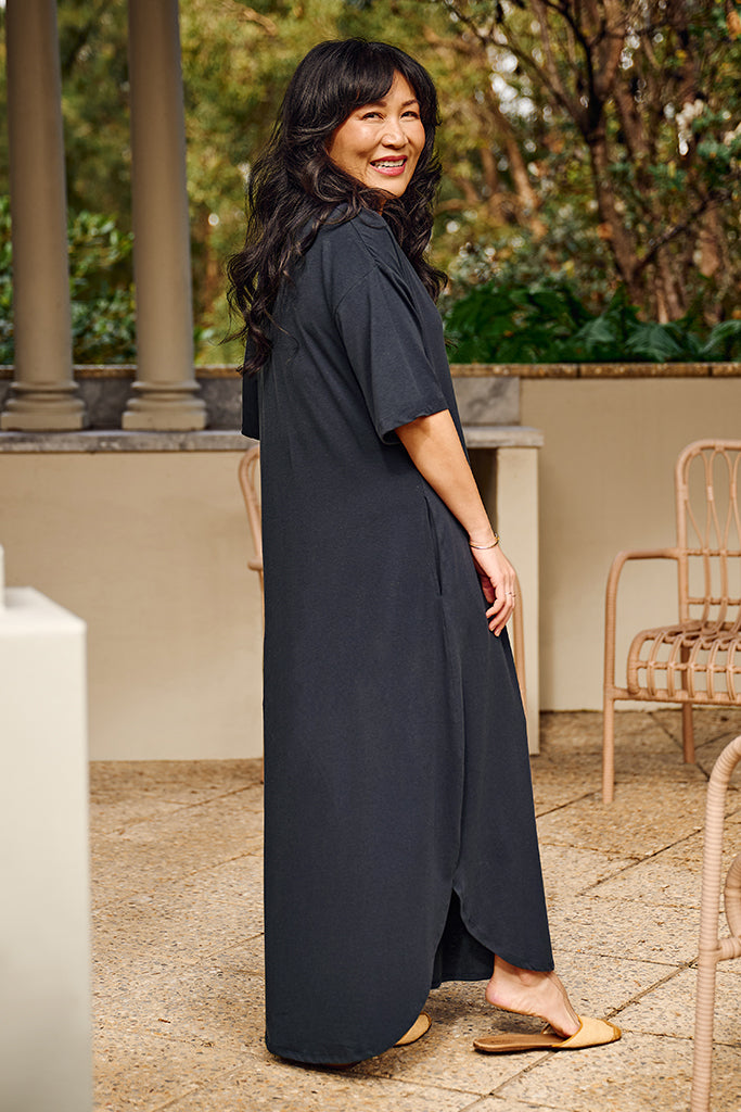 Side view of navy oversized maxi dress in navy.