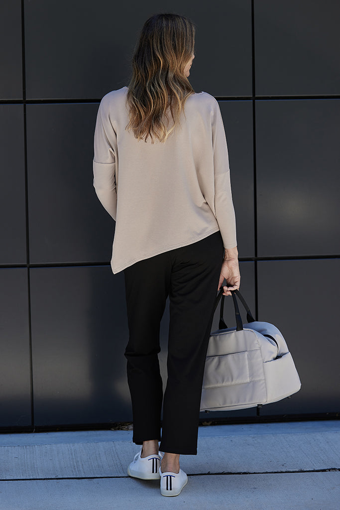 back view of the soft travel pant with straight leg ankle length