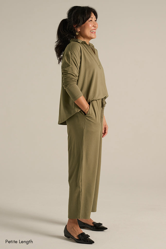 side view of the bamboo trackpant in khaki green colour with side pockets and petite length