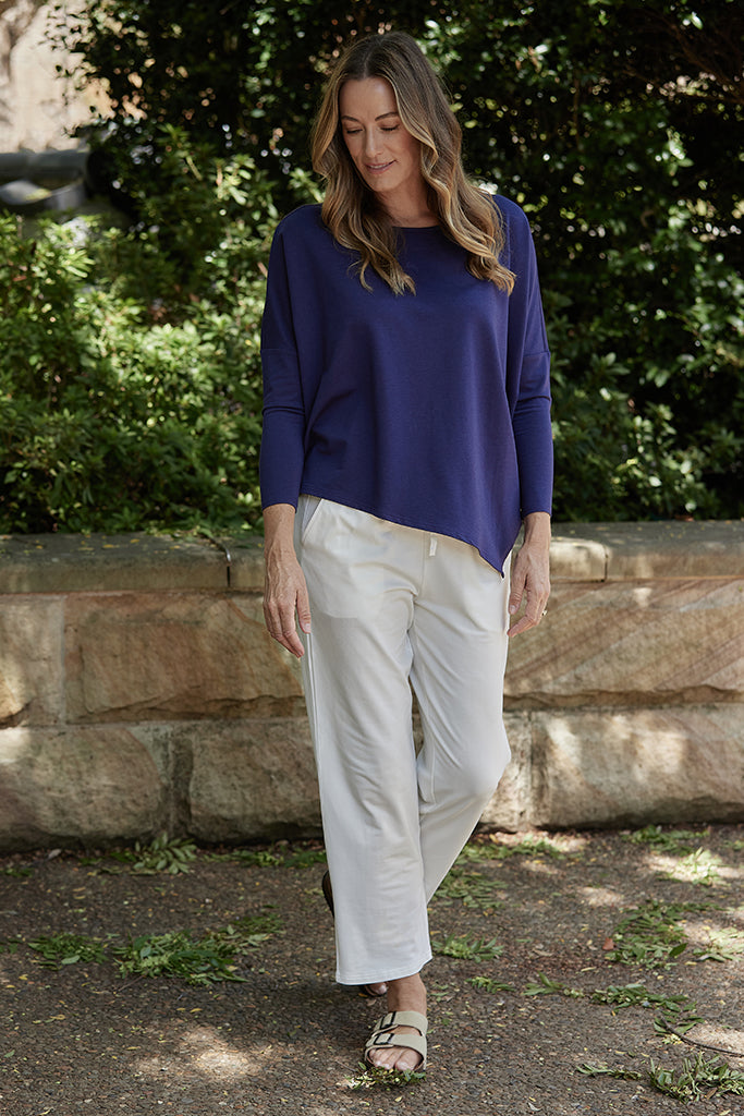 cozy soft white pants with side pockets and ankle length