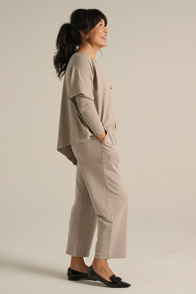 side view of the straight taupe-coloured pants with side pockets