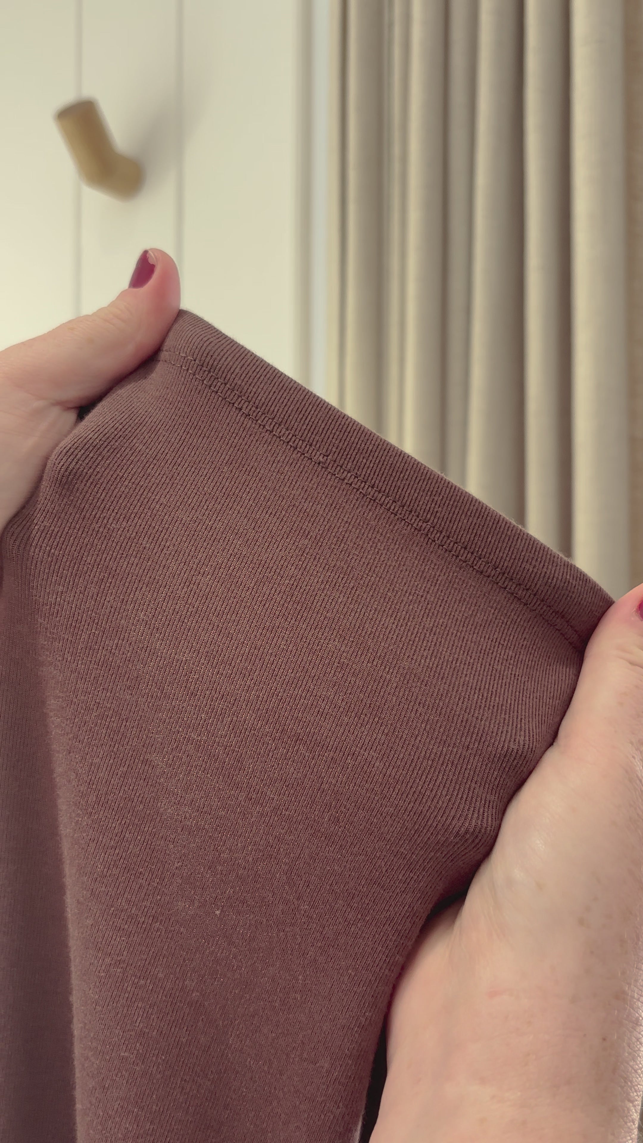 Eco-friendly ribbed brown dress made from flexible, stretchy bamboo fabric.