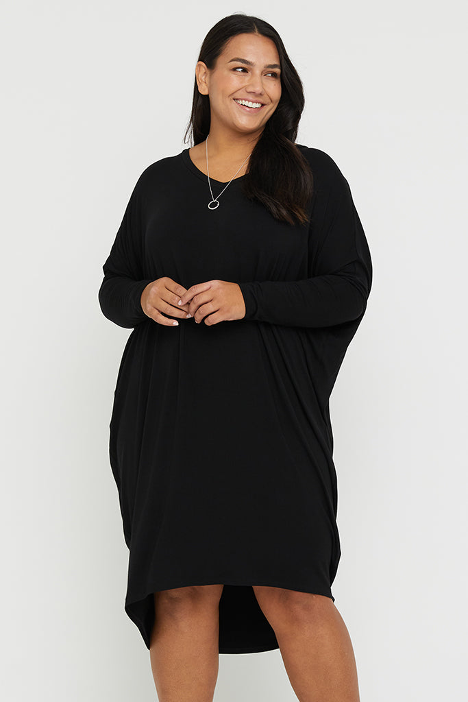 Curvy black bamboo dress with double layer fitted sleeves.