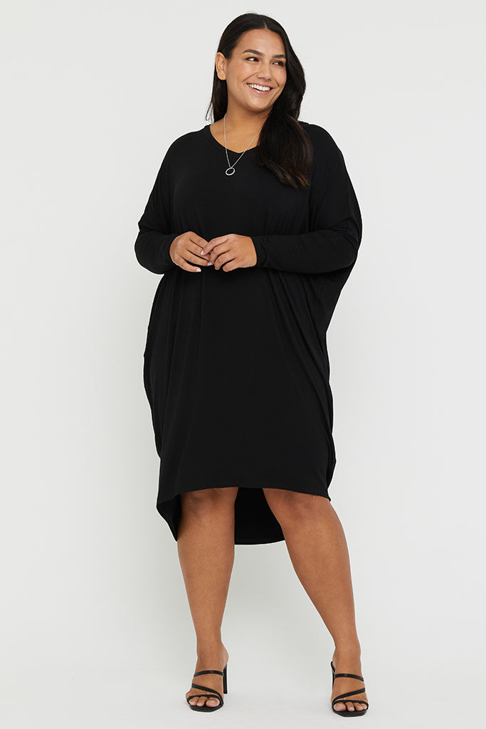 Black bamboo dress with batwing sleeves.