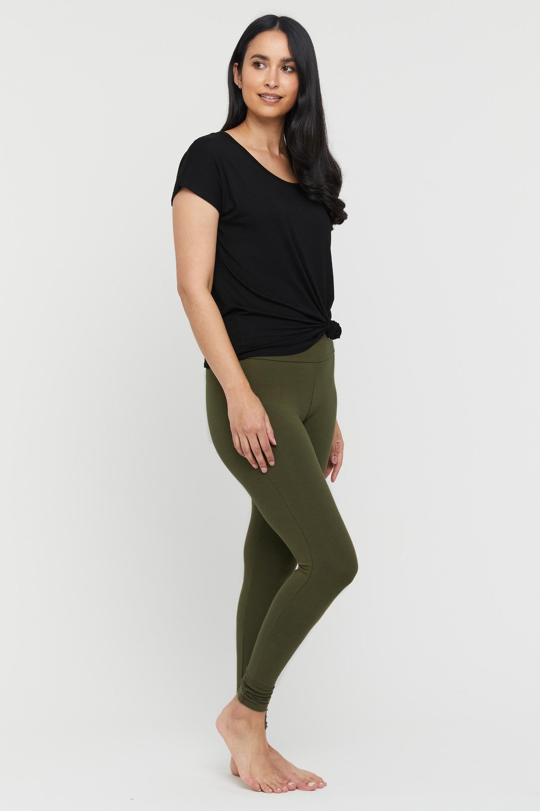 side view of the khaki full length leggings with a wide stretchy waistband