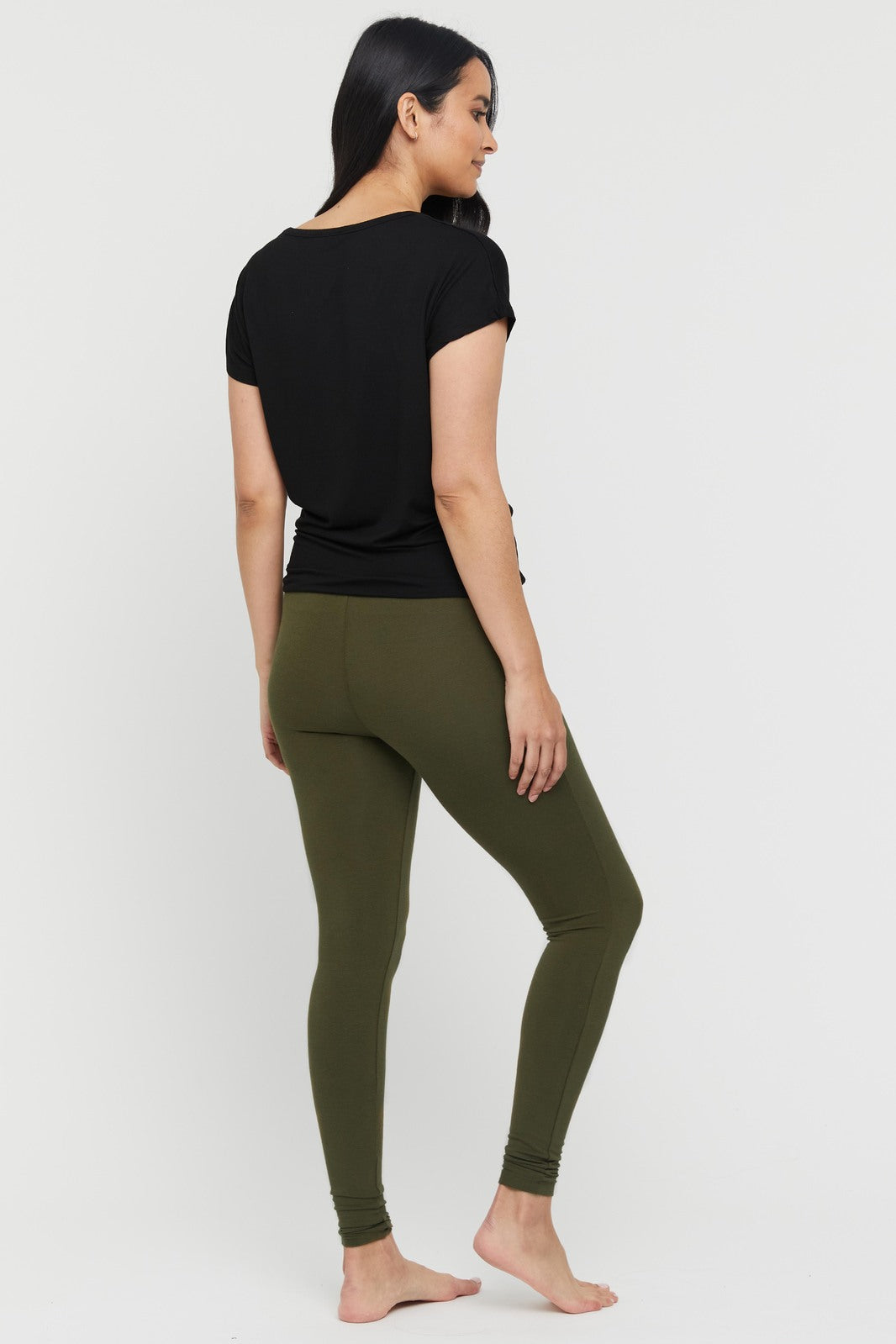 a back view of the dark olive bamboo leggings