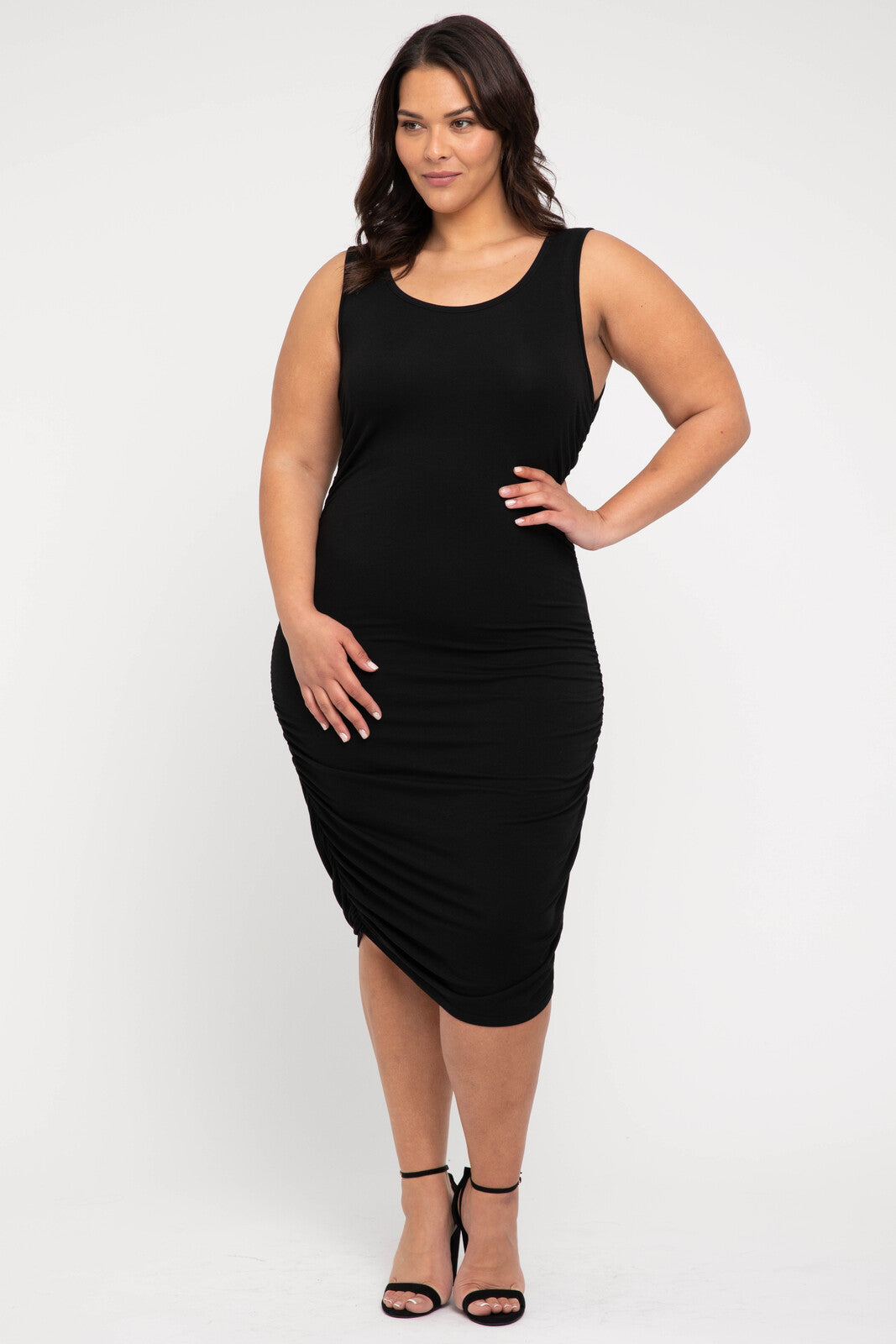 Elegant black ruched tank dress crafted from sustainable bamboo fabric, flattering fit for casual and evening occasions.