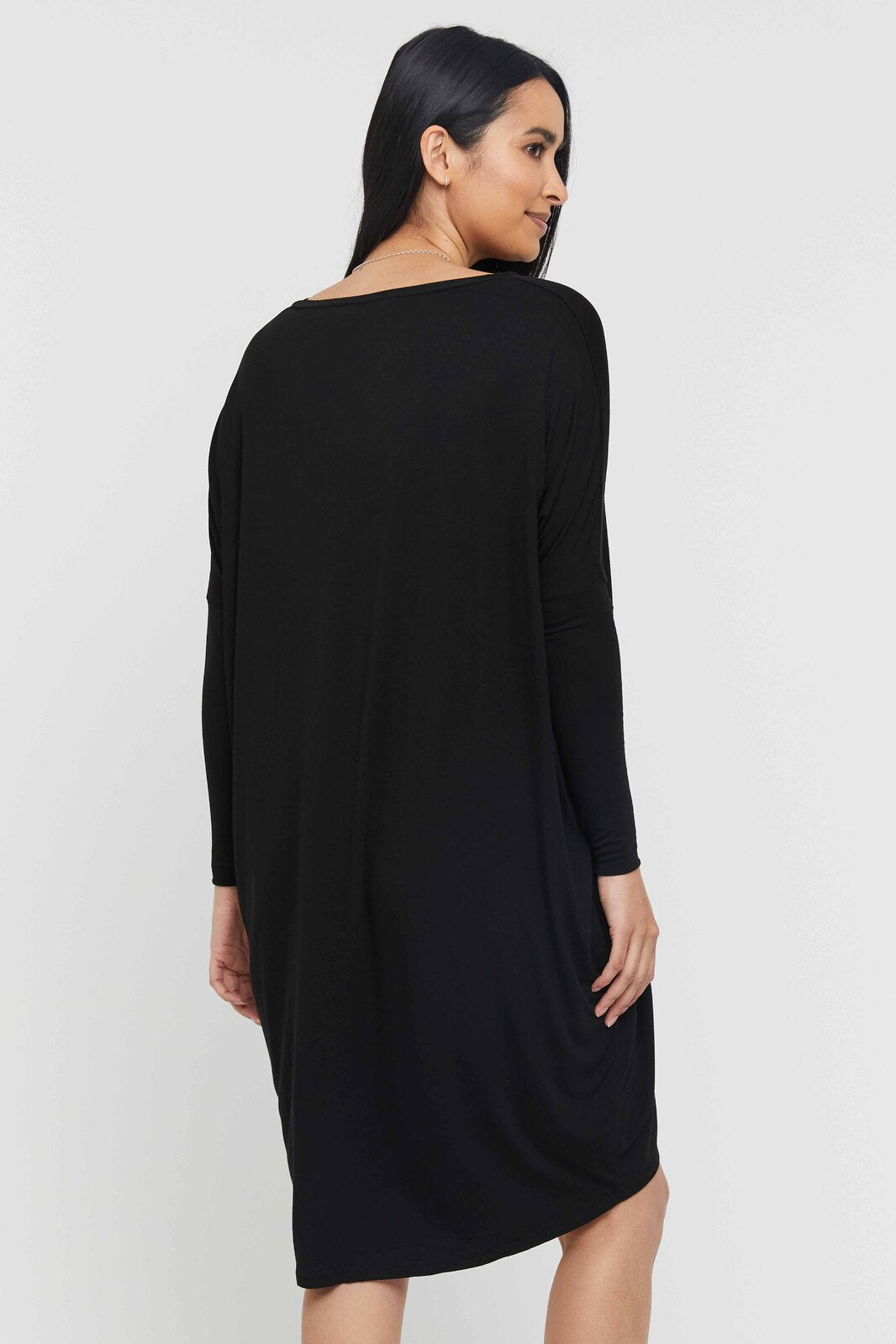 Flowy and breathable black bamboo dress with natural stretch and comfortable fit.