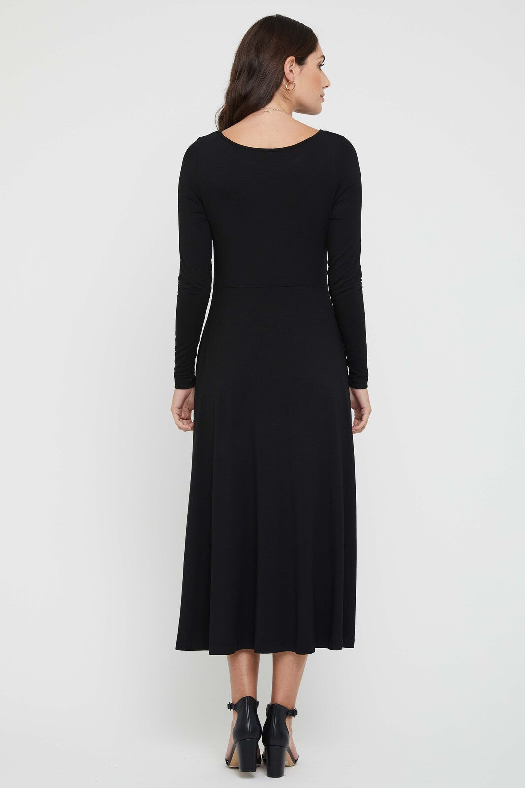 Sustainable black long sleeve dress for everyday wear.